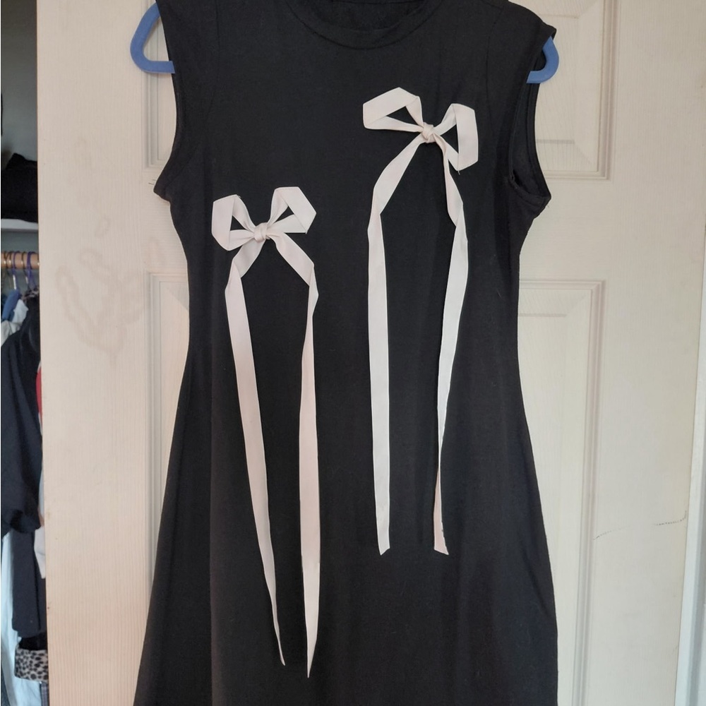 Cider Black Mini Dress with White Bow Accents